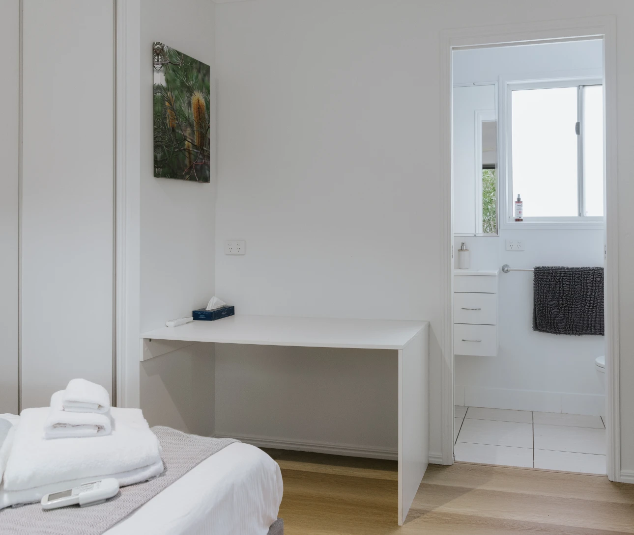 Photo of a bedroom and bathroom