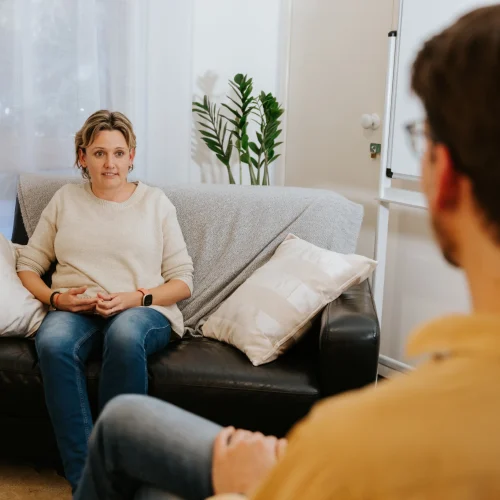 A woman in a therapy session A photo of a therapy session