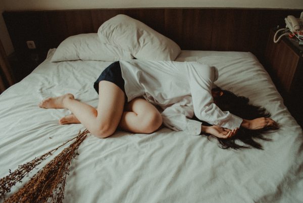 Depressed Women On Bed