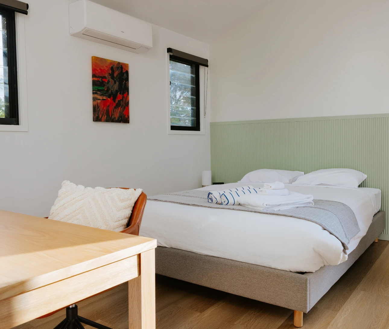 A bedroom and study desk